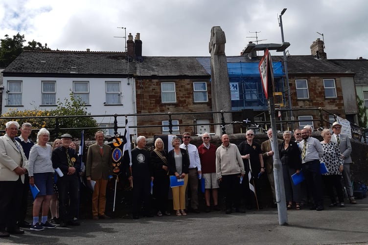 The crowd which gathered at the memorial at Lower Bore Street in the town