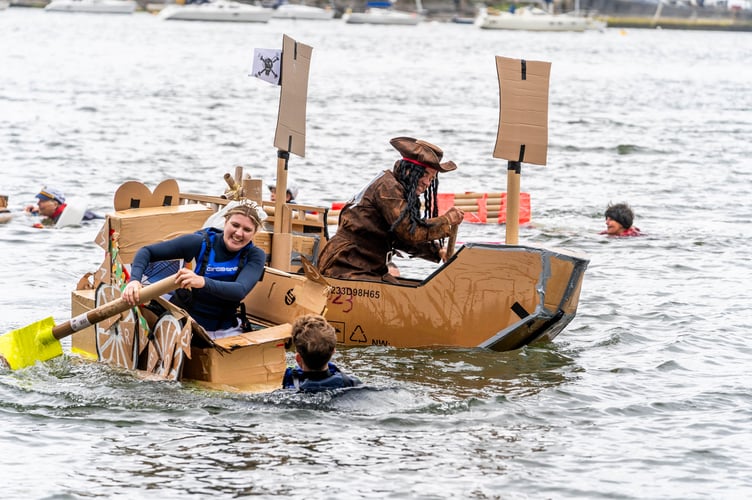 Soggy boats and bottoms with the regatta’s infamous cardboard boat race. (Picture: Mike Pitches Photography)