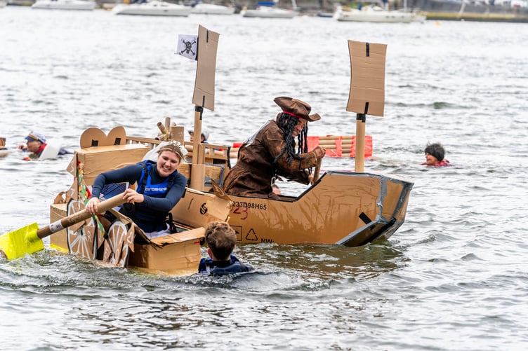 Soggy boats and bottoms with the regatta’s infamous cardboard boat race. (Picture: Mike Pitches Photography)