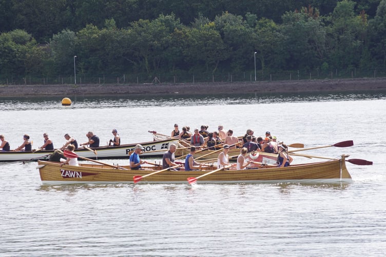 Four gig boats on the river Tamar at Saltash