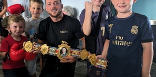 Boxer receives a hero's welcome after winning British title