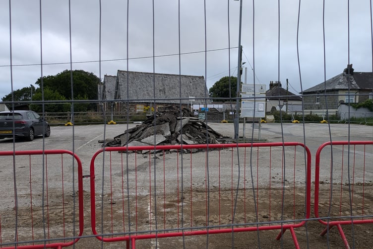 THE view from the other side of the building site, with the Liskerrett Centre marooned beyond the fence