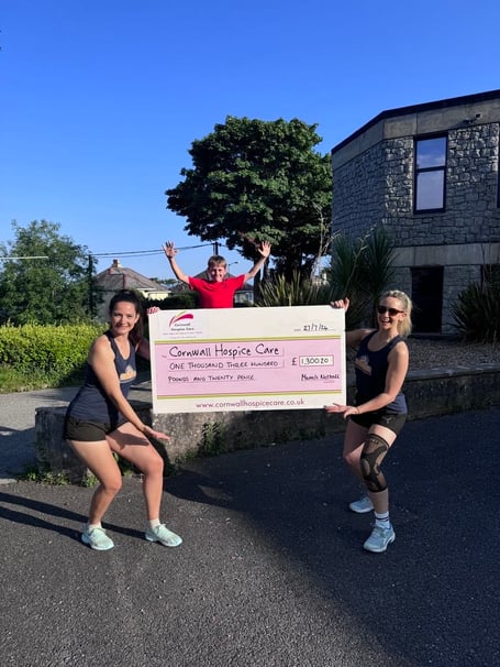 Sarah (right), Fletcher (Sarah’s Son) and Megan (left) from Marvels with the cheque  