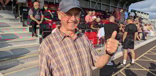 Truro City fans celebrate the unveiling of the club's new stadium