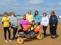 Cornish brewery support adaptive surfing charity with donation