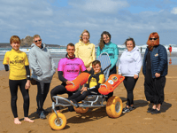 Cornish brewery support adaptive surfing charity with donation