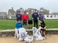 Housebuilder hands make light work of beach clean