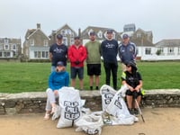 Housebuilder hands make light work of beach clean