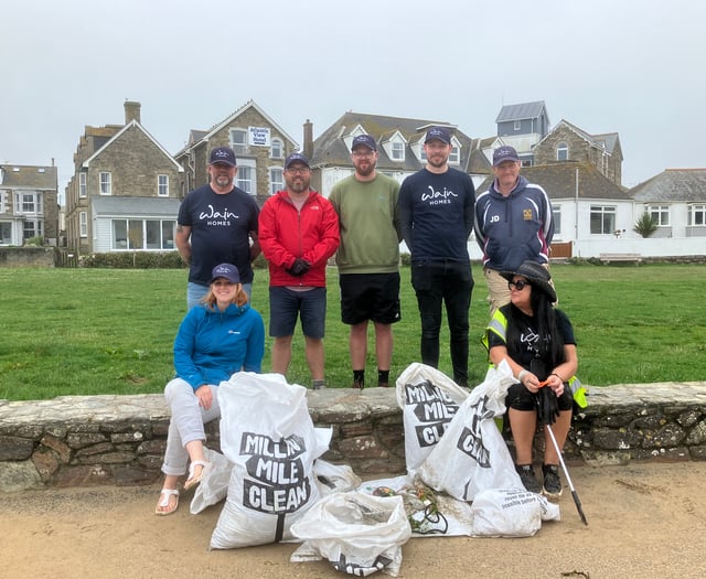 Housebuilder hands make light work of beach clean