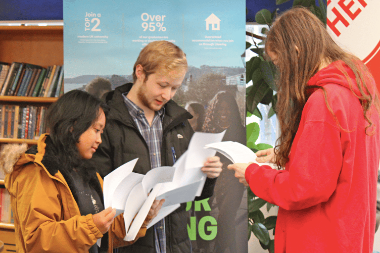 Students anxiously opened their results, hoping that their hard work had paid off