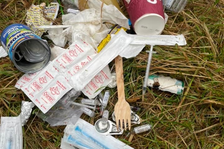Needles and rubbish left at the community orchard within the grounds of New County Hall in Truro (Picture: Anonymous post on Facebook)