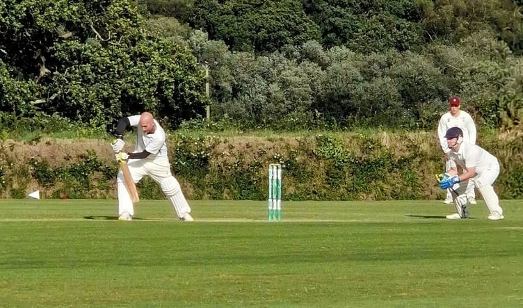 Gunnislake all-rounder Graeme Murray gets forward to a delivery at Werrington on Saturday.
