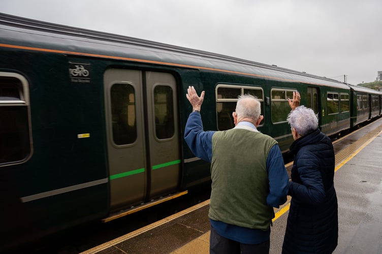 Margaret and George Stone as they celebrate their 65th wedding anniversary by waving off trains at Carbis Bay