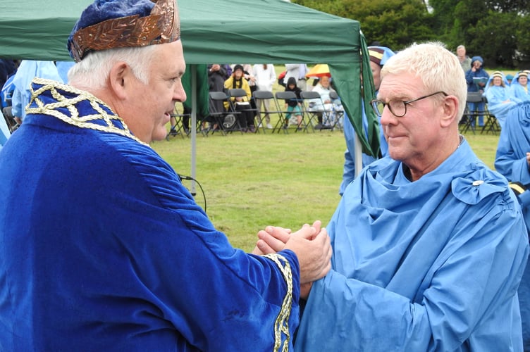 Kim Conchie is made a Bard by Grand Bard Pol Hodge at Gorsedh Kernow in Callington