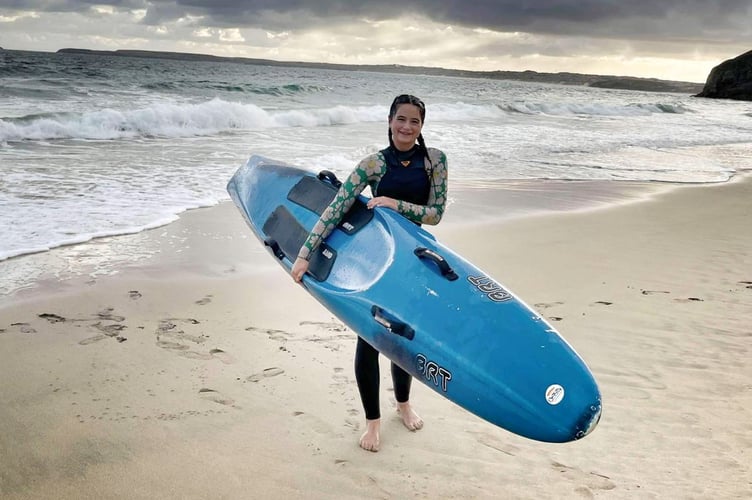 Elsie Berriman who surfs to school from Hayle to Carbis Bay in Cornwall. Release date September 13 2024. Meet the 13-year-old girl who surfs to school everyday - powering through jellyfish stings during the unique commute.  Elsie Berriman paddles on a board across the sea from Hayle to Carbis Bay in Cornwall. Waking up at the crack of dawn Elsie gets in the water at 6:30am - where it takes roughly an hour to get to Carbis Bay - usually arriving at around 7:45am. The determined surfer then uses the outdoor showers on the beach in her wetsuit, gets ready and heads up to school. She is doing the school commute surf on an epic fundraising mission for her local surf club.