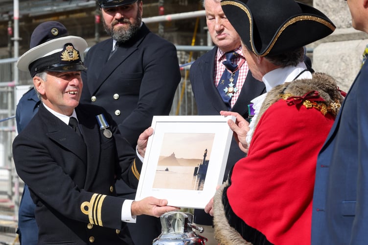 HMS Penzance handing back the Freedom of the Town ceremony in front of St John's Hall, Penzance, on Thursday 12 September 2024. 
Lt Cdr Trevor Brookes is joined by Commodore Miller, Lt Owen Leo Moore and ETWE Callum Ward to hand back the Freedom of the Town to Mayor of Penzance, Councillor Stephen Reynolds in a short ceremony following the de-commission of HMS Penzance earlier this year. 