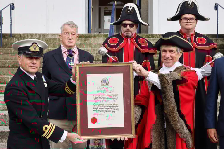 HMS Penzance handing back the Freedom of the Town ceremony in front of St John's Hall, Penzance, on Thursday 12 September 2024. 
Lt Cdr Trevor Brookes is joined by Commodore Miller, Lt Owen Leo Moore and ETWE Callum Ward to hand back the Freedom of the Town to Mayor of Penzance, Councillor Stephen Reynolds in a short ceremony following the de-commission of HMS Penzance earlier this year. 