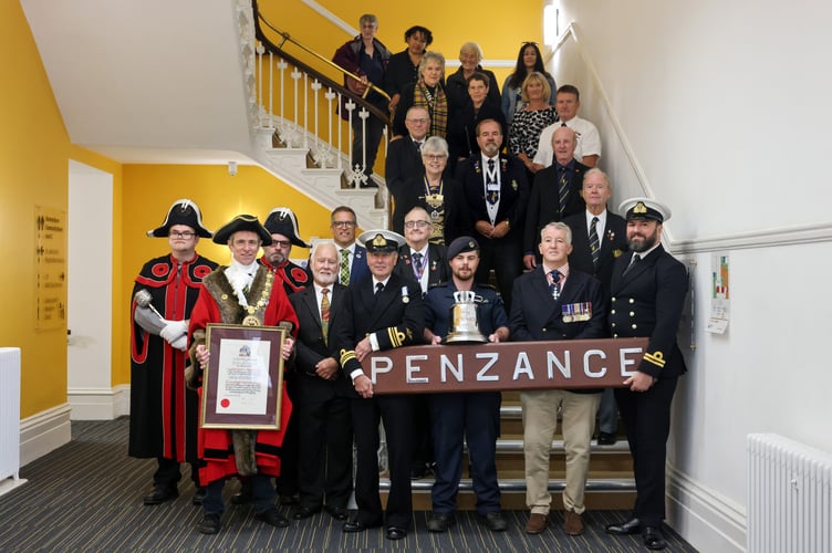 HMS Penzance handing back the Freedom of the Town ceremony in front of St John's Hall, Penzance, on Thursday 12 September 2024. 
Lt Cdr Trevor Brookes is joined by Commodore Miller, Lt Owen Leo Moore and ETWE Callum Ward to hand back the Freedom of the Town to Mayor of Penzance, Councillor Stephen Reynolds in a short ceremony following the de-commission of HMS Penzance earlier this year.