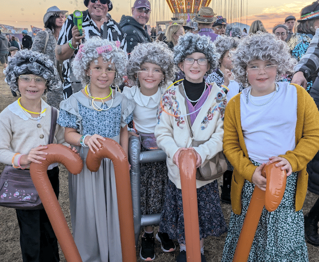 Revellers enjoy a jolly good knees up at cider and music festival 