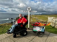 Steven reaches Land's End in his electric wheelchair