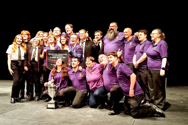 Members of St Austell Town Band celebrate their national triumph.