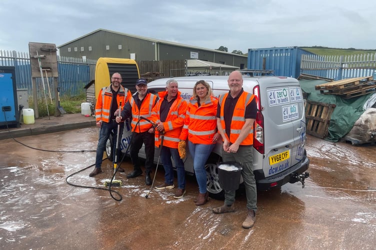 Workers from SUEZ taking part in the car wash at St Dennis.