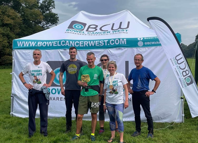 Winner Oli Jones (centre) with crew and his fellow East Cornwall Harriers' runners. From left: Gareth Price, Simon O'Hora, Rachael Young, Ali O'Hora and John Sudell.