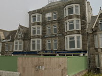 Arson suspected following blaze at derelict hotel