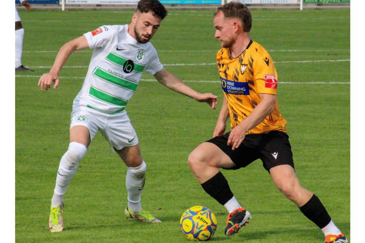 Falmouth Town midfielder Andrew Elcock on the ball against his old club. Picture: Jasmyn Richards