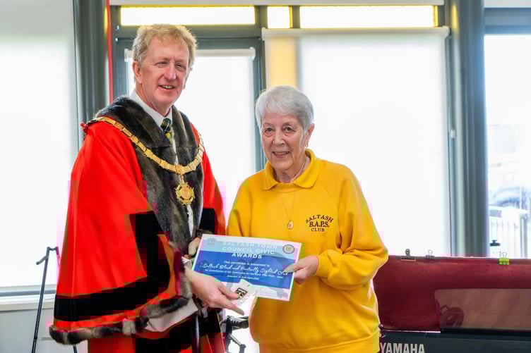 Saltash BAPS lead Shirley receiving the civic award for contribution to the community in 2023.