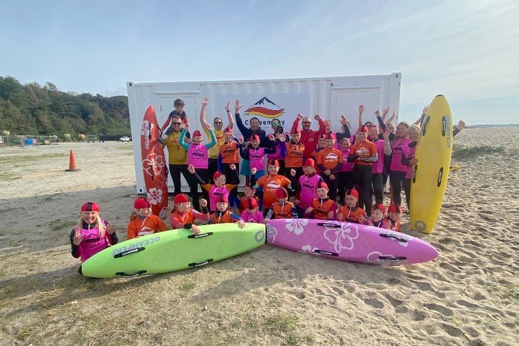 Members of the Carlyon Bay Surf Life Saving Club celebrate the support they have been given.