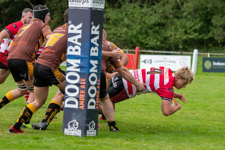 St Austell lock George Oakley, who was also named man of the match, dives over to score. Picture: Dave Phillips
