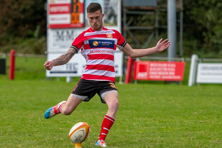St Austell full-back Dan Haley slots over one of his two conversions. Picture: Dave Phillips