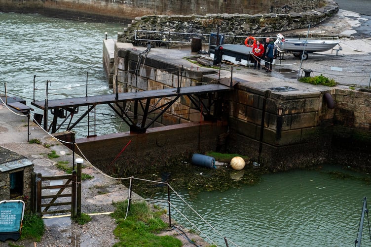 The lockgate has been further damaged by stormy seas and is no longer safe for pedestrians to use. Picture: Paul Williams