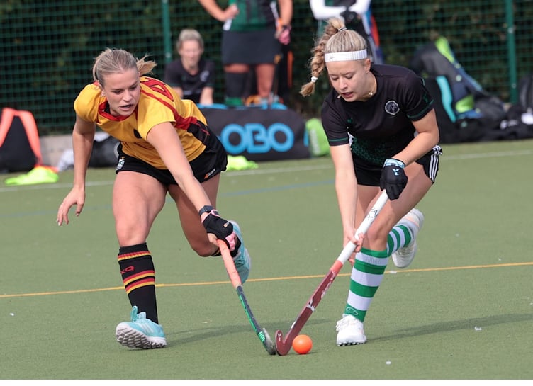 Caradon's player of the match Abby Ingram (left) looks to steal possession. Picture: Glen Rogers