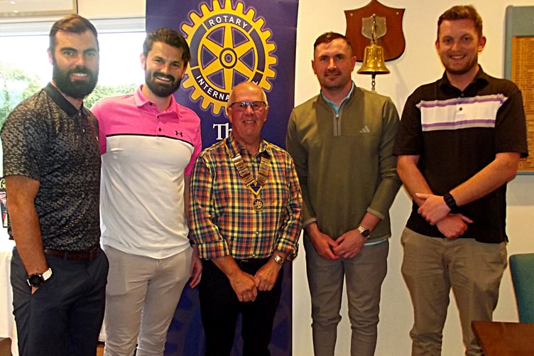 Rotary president Paul Hancock (centre) congratulates the winning team, left to right, Matt Boynton, Luke Damerell, Adam Scott and Will Houseman.