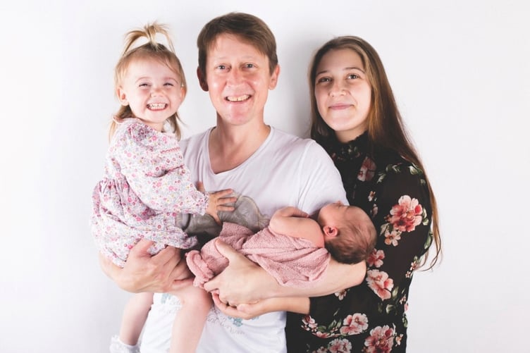 Gavin and Alisha Hawke pictured with Evelyn and Elizah, when she was a baby.