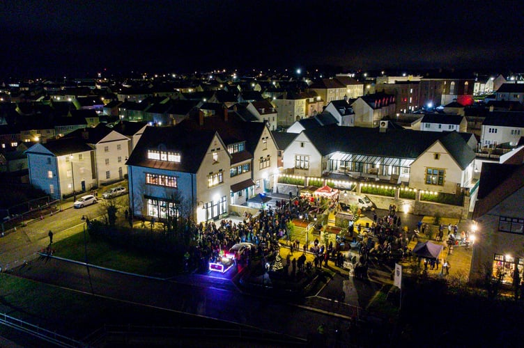NANSLEDAN, NEWQUAY : December 15 2023 : Christmas Market night featuring seasonal stalls in Kew An Lergh and a visit from Santa Claus, photographed by Hugh Hastings for the Duchy of Cornwall.