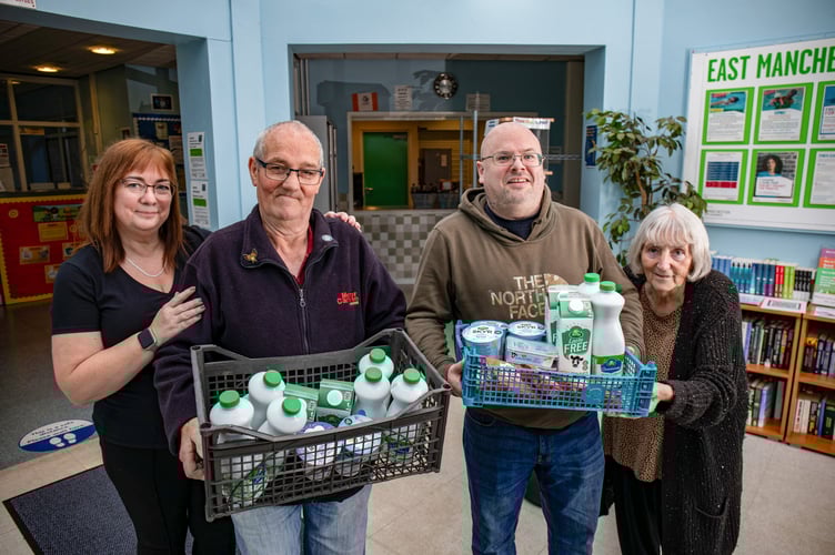 Team at the Clayton Sure Start Centre in Manchester recieving donations and stocking the fridge from Arla, which includes a variation of dairy and dairy free items. A partnership between Arla and Fareshare. 08/10/24