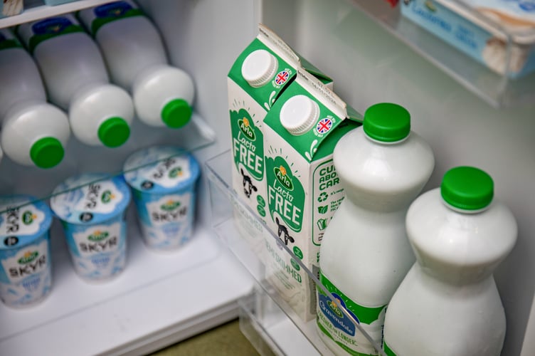 Team at the Clayton Sure Start Centre in Manchester recieving donations and stocking the fridge from Arla, which includes a variation of dairy and dairy free items. A partnership between Arla and Fareshare. 08/10/24