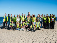 Staff at holiday park help clear up the coastline