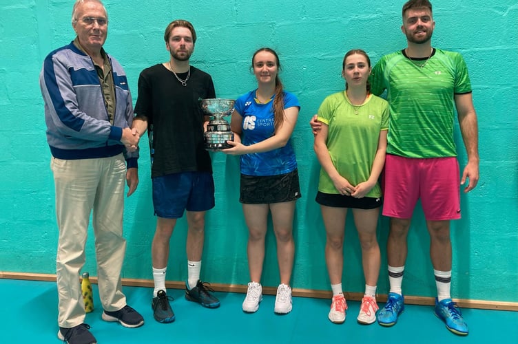 County selector Brian Hannibal presents the mixed doubles cup to champions Elliot Dyer (Truro) and Hope Warner, with runners up Joanna Vyvyan and Jack Dyer (Truro). Picture: Cornwall Badminton