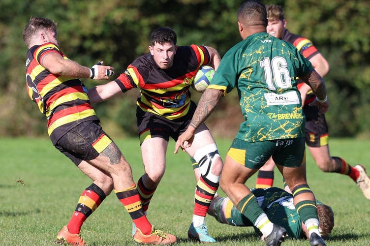 Saltash hooker Rob Walsh, who scored two tries on Saturday, runs at the Perranporth defence. Picture: Glen Rogers
