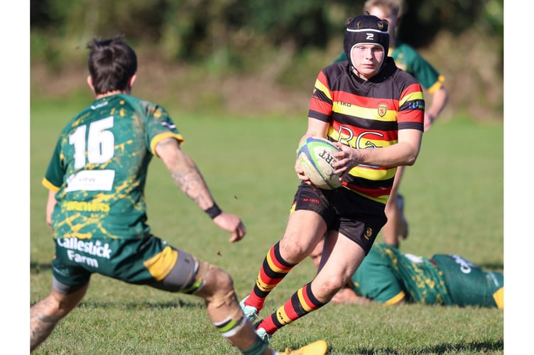 Saltash fly-half Billy Dover looks to make inroads. Picture: Glen Rogers
