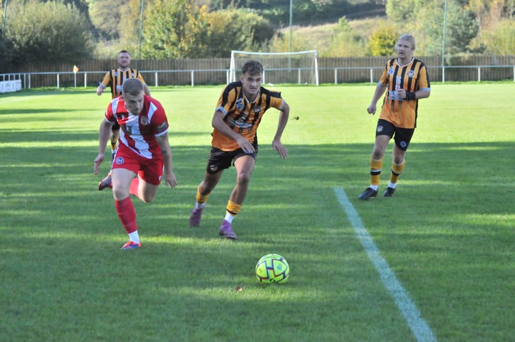 Callam Mconie turning the Axminster defence inside out. Picture: Steve Rich