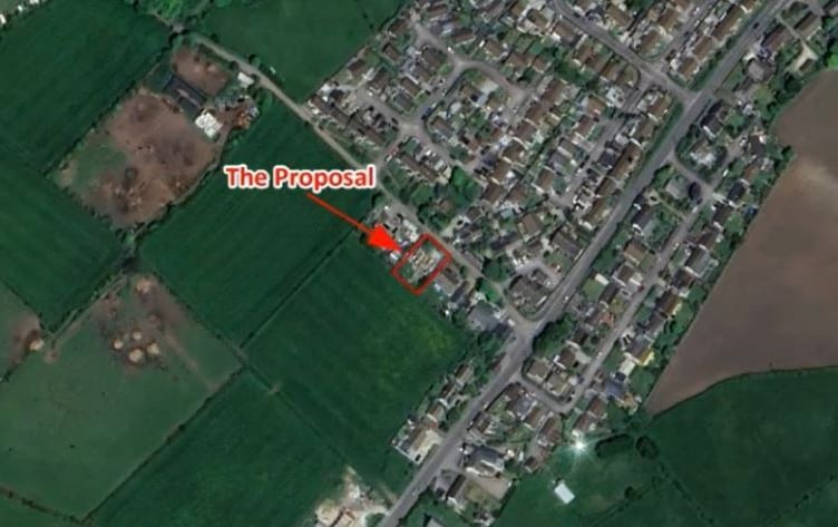 Where the fire-damaged bungalow would be replaced with two houses.