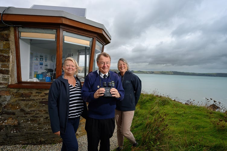 Peter Evans, station manager at NCI Portscatho, with Leonie Iddison (left) and Liz Arnell from Classic Cottages
