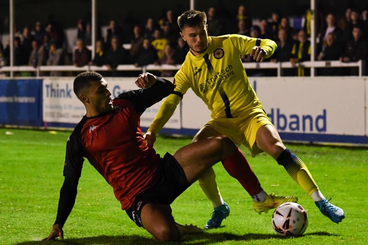 Christian Oxlade-Chamberlain (left) battles for the ball at Farnborough. Picture: Dave Vokes