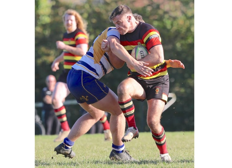 Centre Jason Carroll scored twice for Saltash during their victory over Camborne School of Mines on Saturday. Picture: Glen Rogers