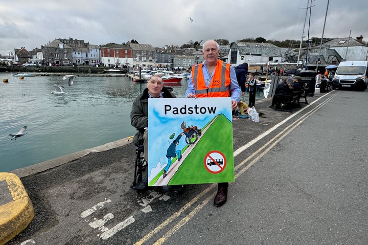 Protesters campaigning against a proposed removal of a bus stop. (Picture: Barry West)